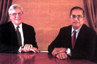John F Imle and Arun Metre (right)