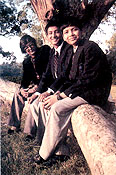 Vidorha Debroy (centre), Nishanka Debroy (extreme right), Bibek Debroy (extreme left)